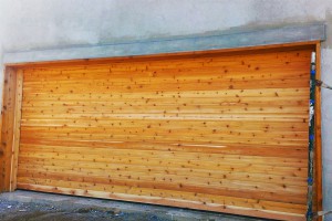 horizontal beam wood paneled garage door