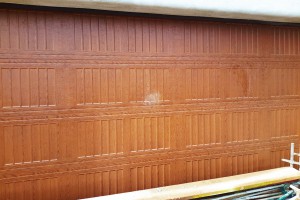 wood paneled garage door progress shot