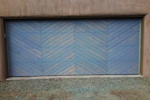 custom diagonal stained wood paneled garage door finished pic