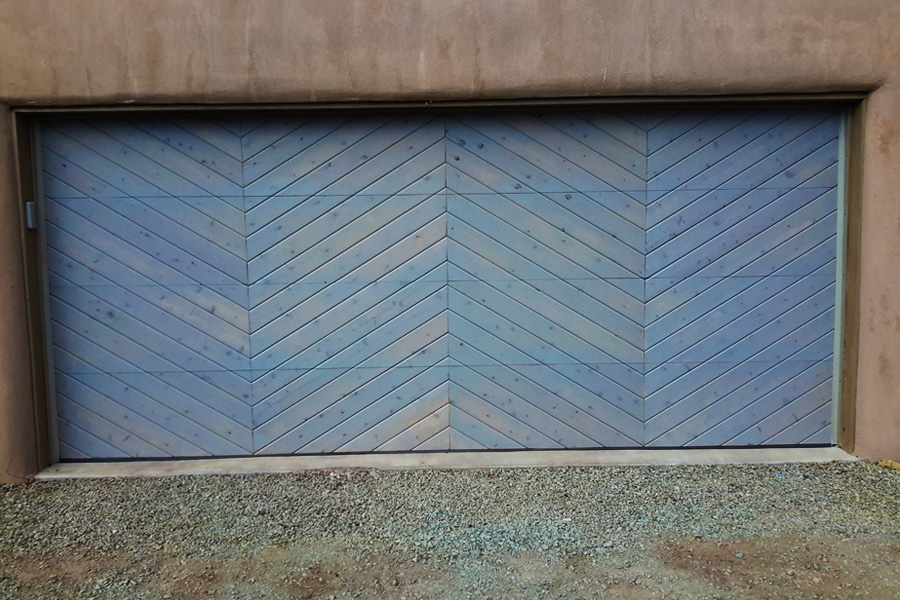 custom diagonal stained wood paneled garage door finished pic