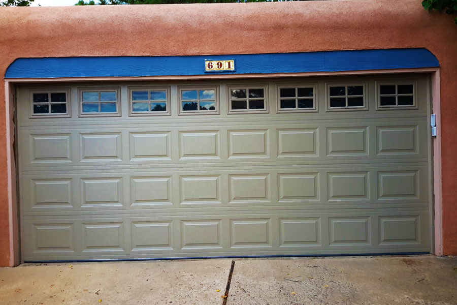 green metal framed custom wide garage door