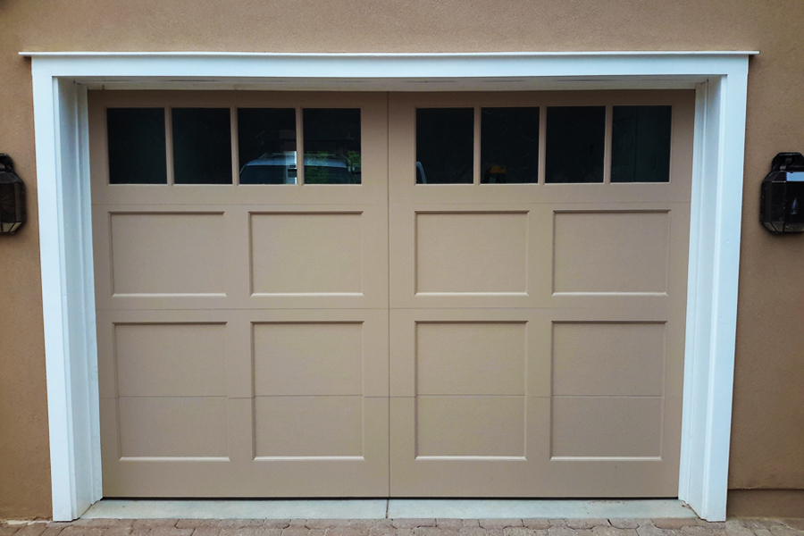 beige ranch style custom garage door