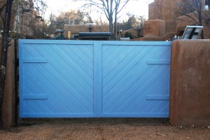 solar powered automatic blue painted wooden gate interior