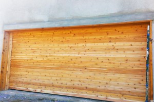 horizontal beam wood paneled garage door