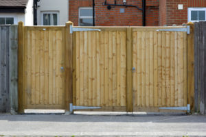 custom reinforced wooden gate and door